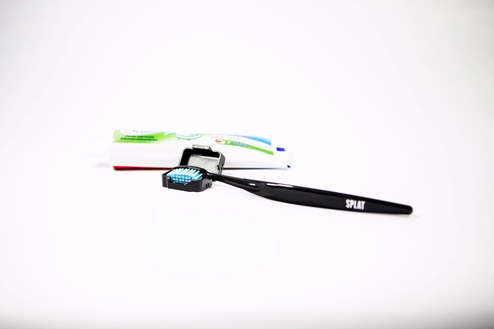 The Brushield has a magnetic locking system to keep it secured around the head of a toothbrush