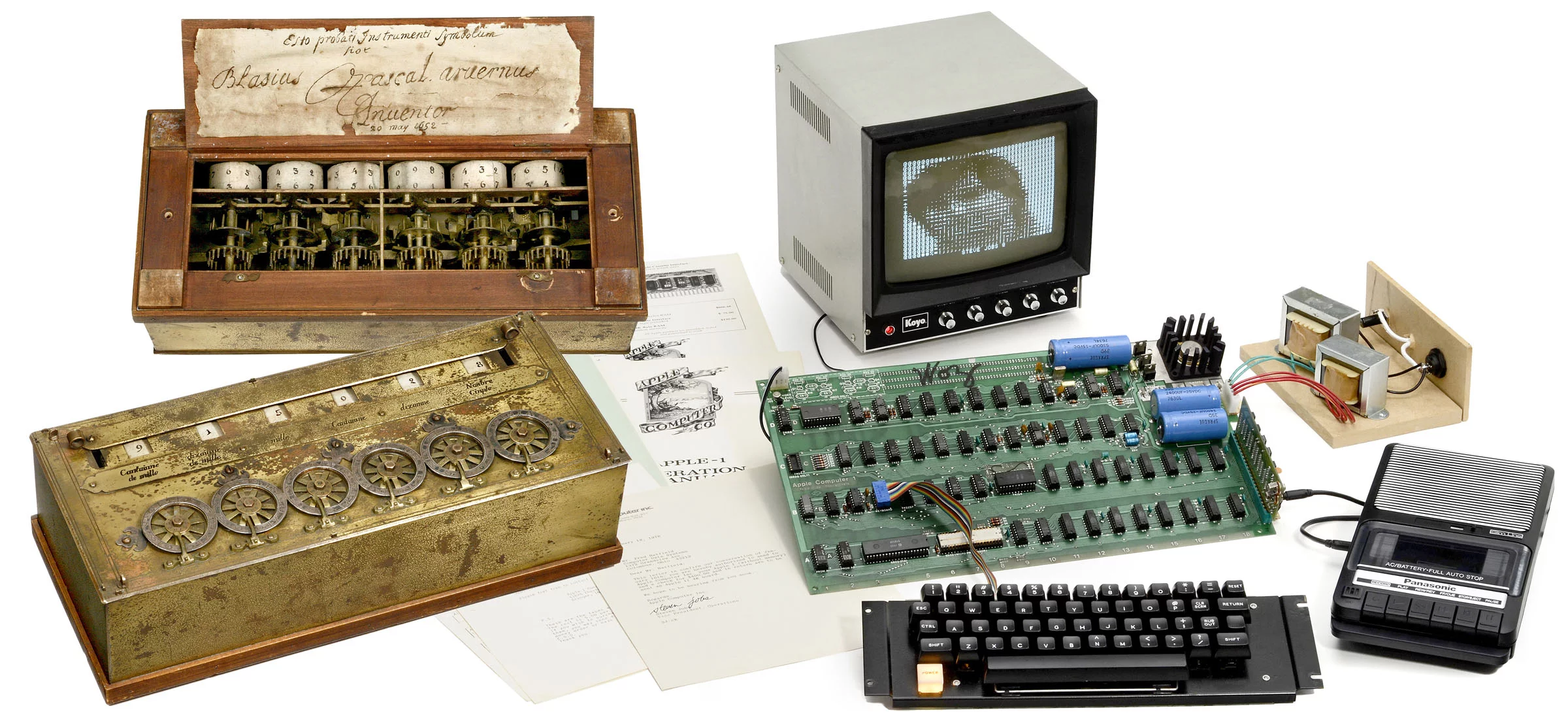 The Auction of Firsts includes an original Apple 1 computer from 1976, and a reproduction Pascaline mechanical calculator