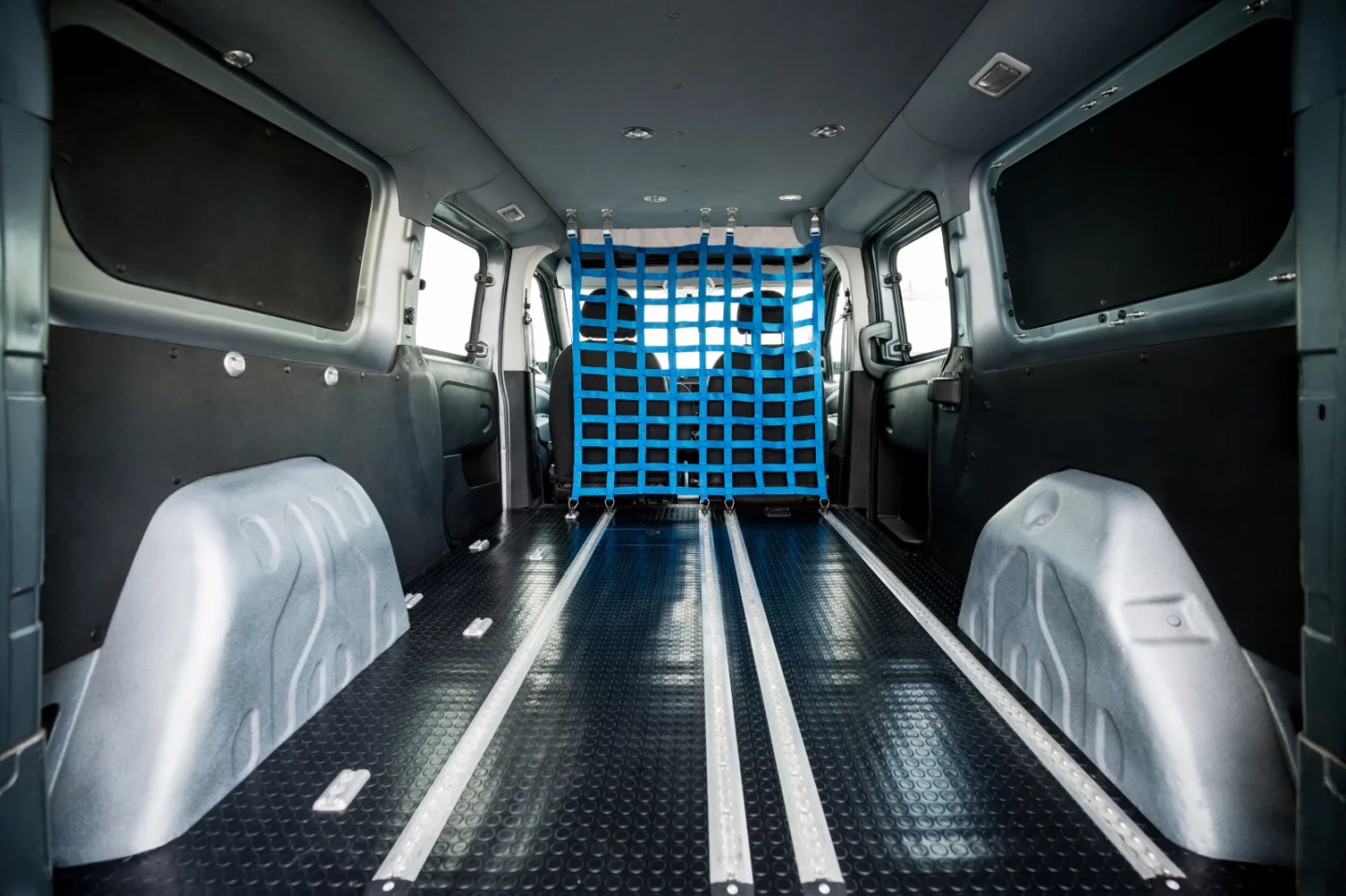 Empty van interior with available cargo net