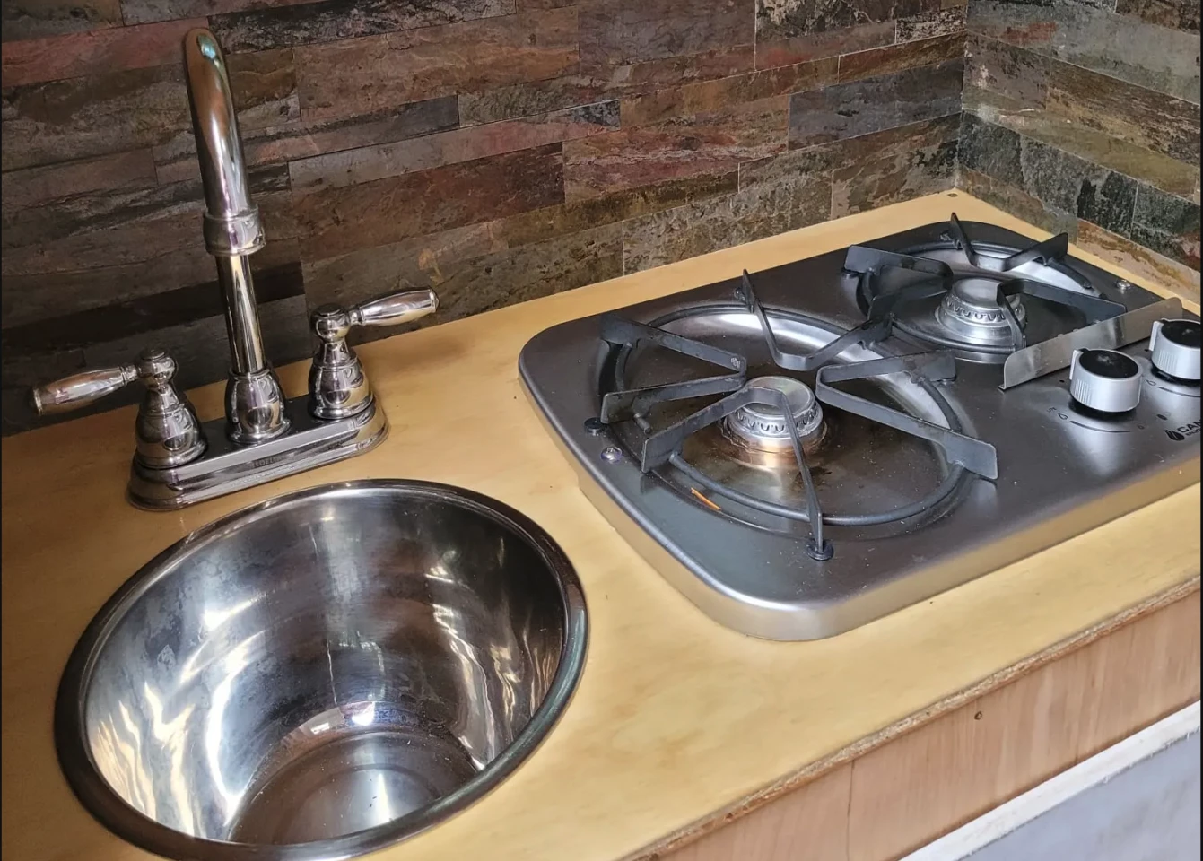 The base model comes only with a countertop, but Backwoods experiments here with a fuller kitchen