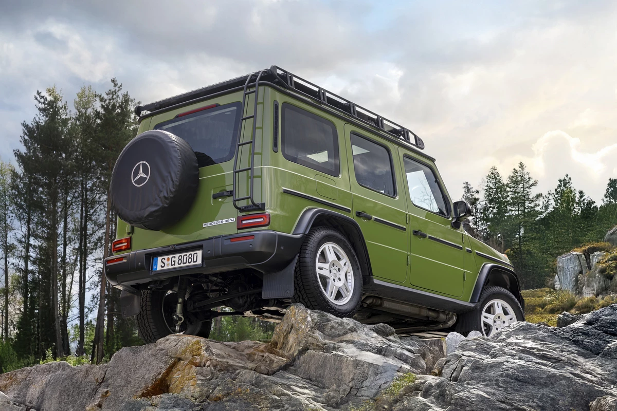 The G-Class STRONGER THAN THE 1980s features a large roof rack, a ladder, and a special soft cover for the spare wheel