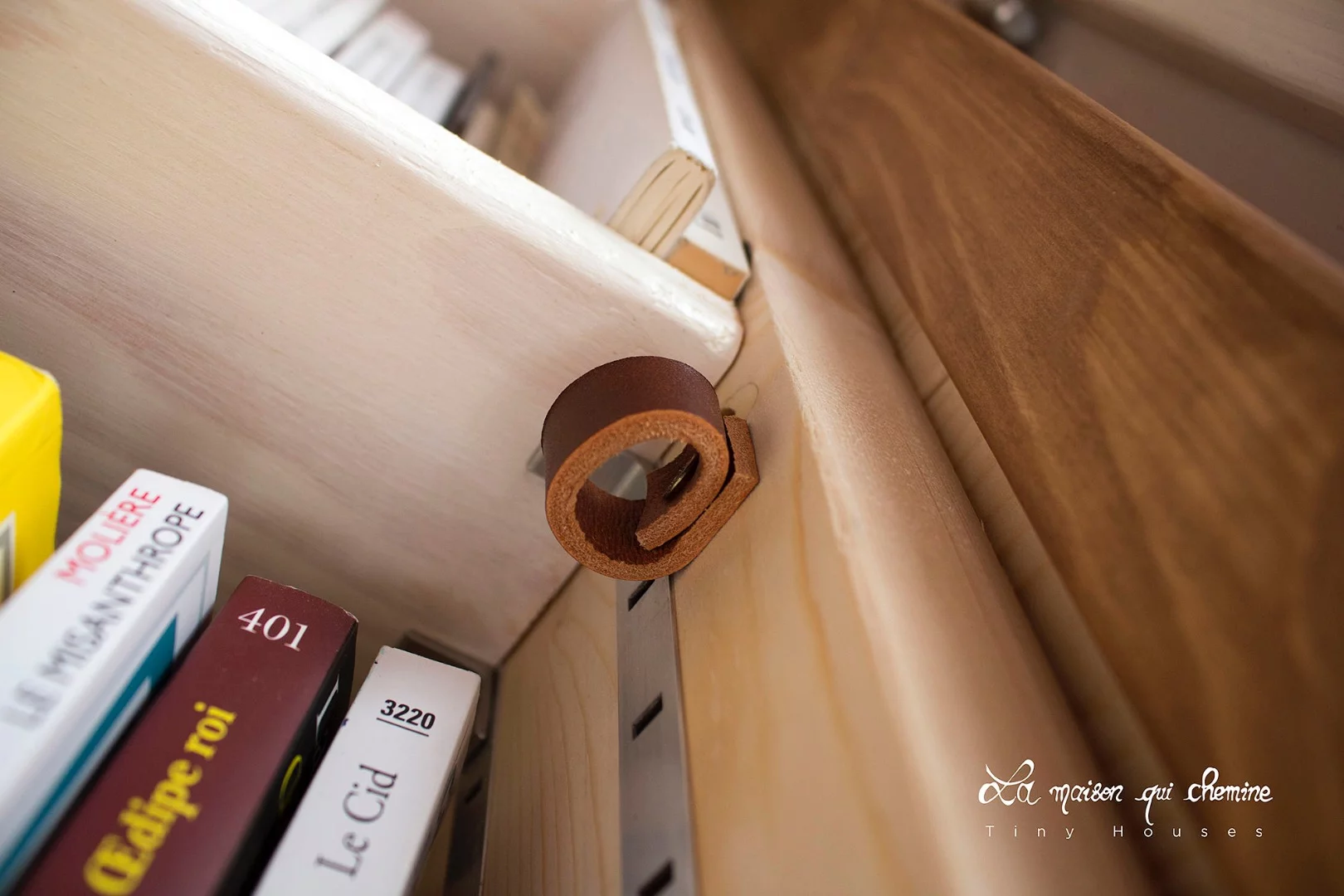 The interior is jam-packed with shelves of books