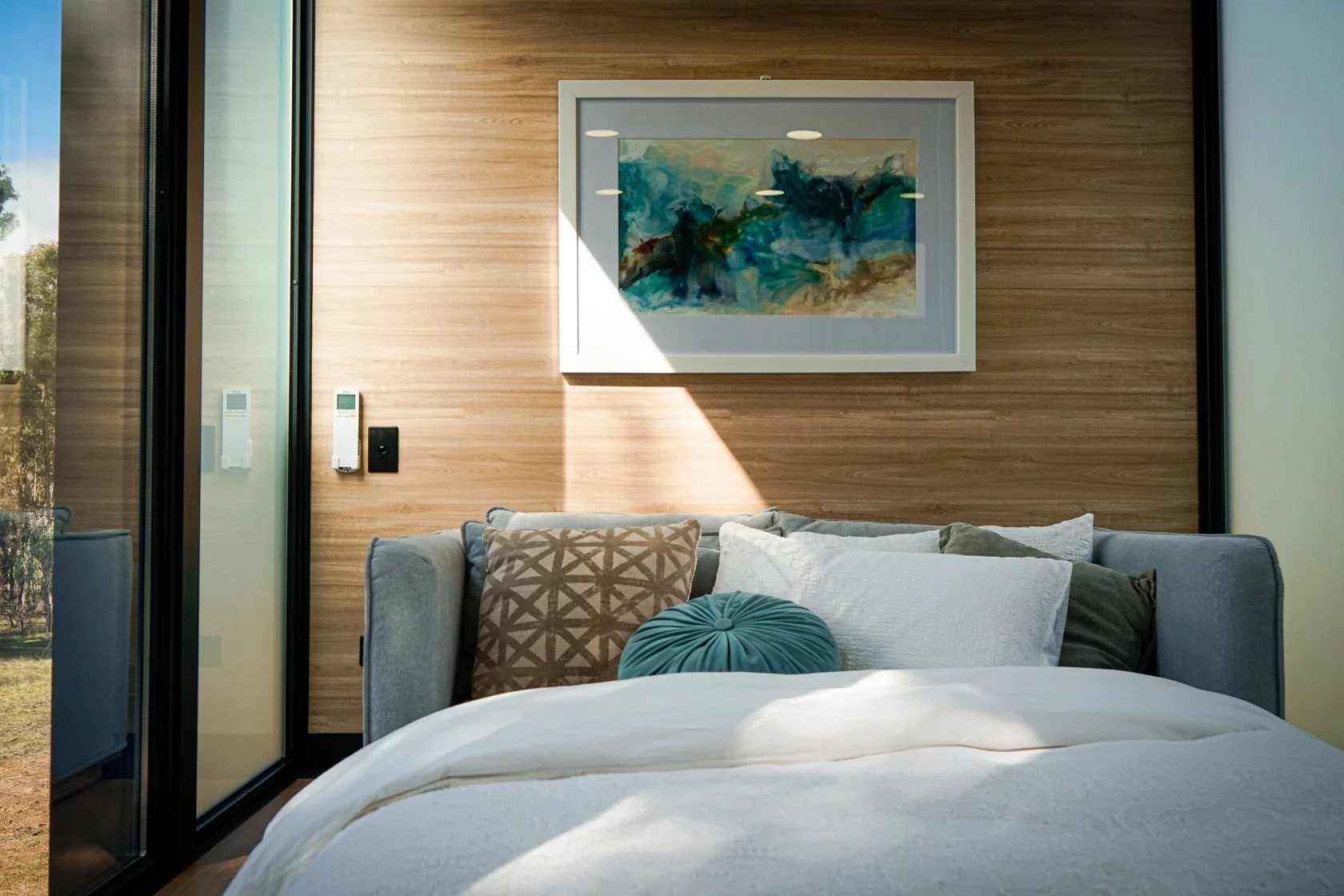 Instead of a separate bedroom, the Beaufort Bushland Retreat includes a sofa bed that sleeps two