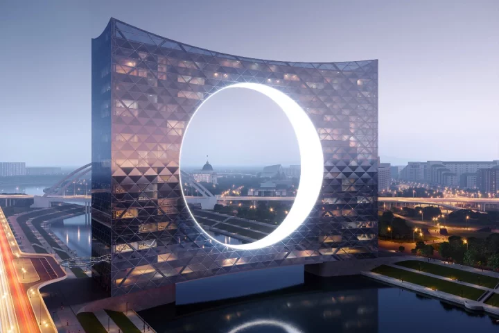 The Tower of the Sun "celebrates near net-zero energy requirements by using the power of water stream in the river underneath"