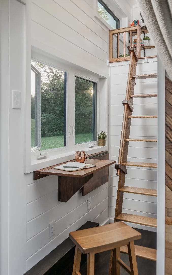 The Escher's home office includes a standing desk
