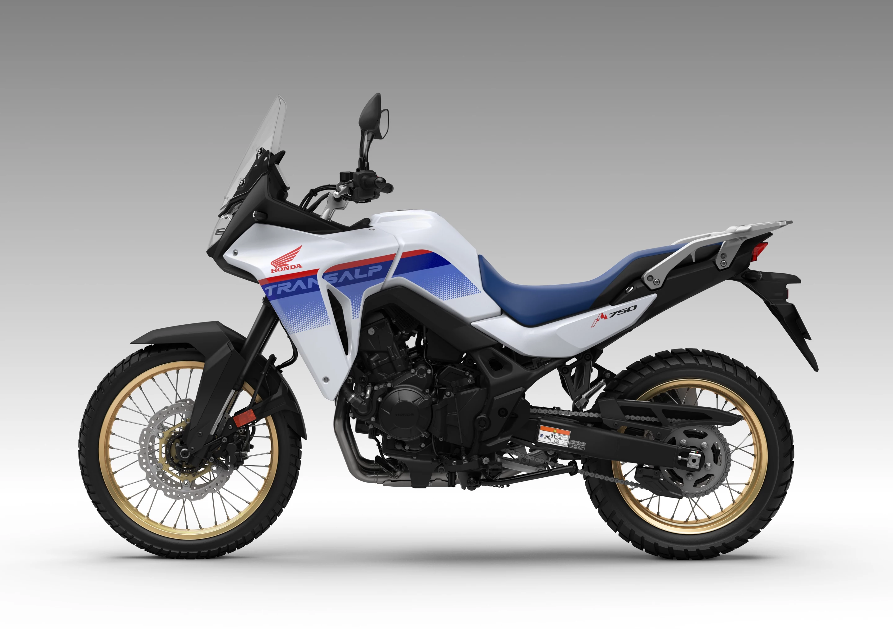 The white-based tricolor theme of the 2023 Honda XL750 Transalp is a direct reference to the model's roots