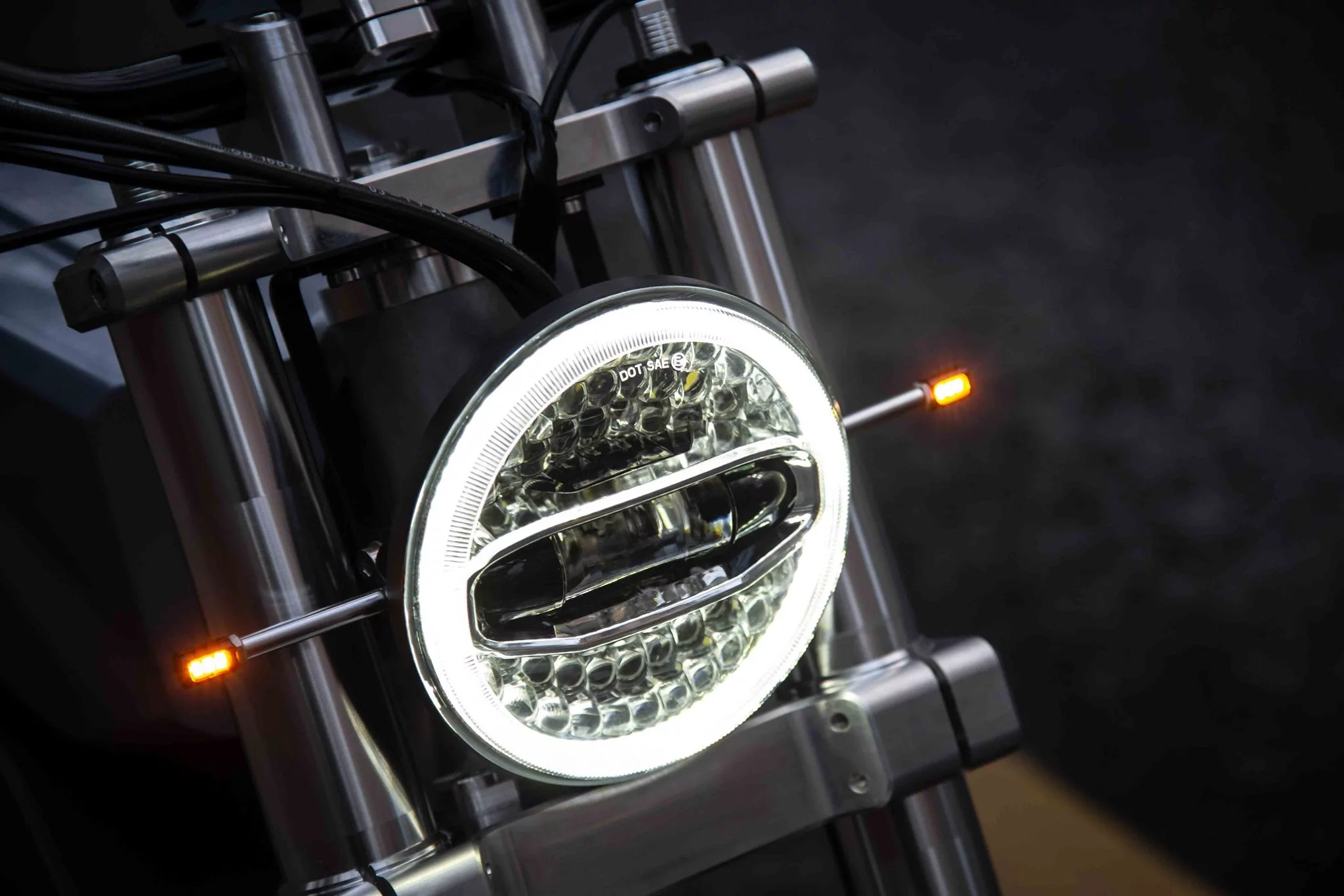 The dinky little turn indicators on either side of the LED headlight will likely have to be changed before regulatory approval and production