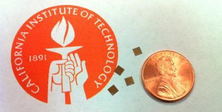 Some of Caltech's new T-Ray chips, with a penny for scale