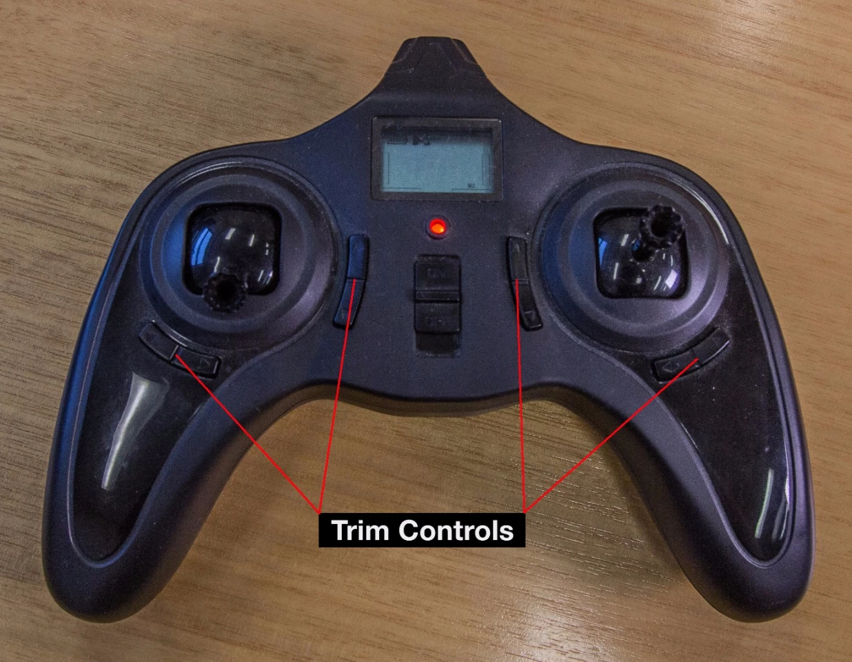 Hubsan X4 controller, showing where the trim controls are