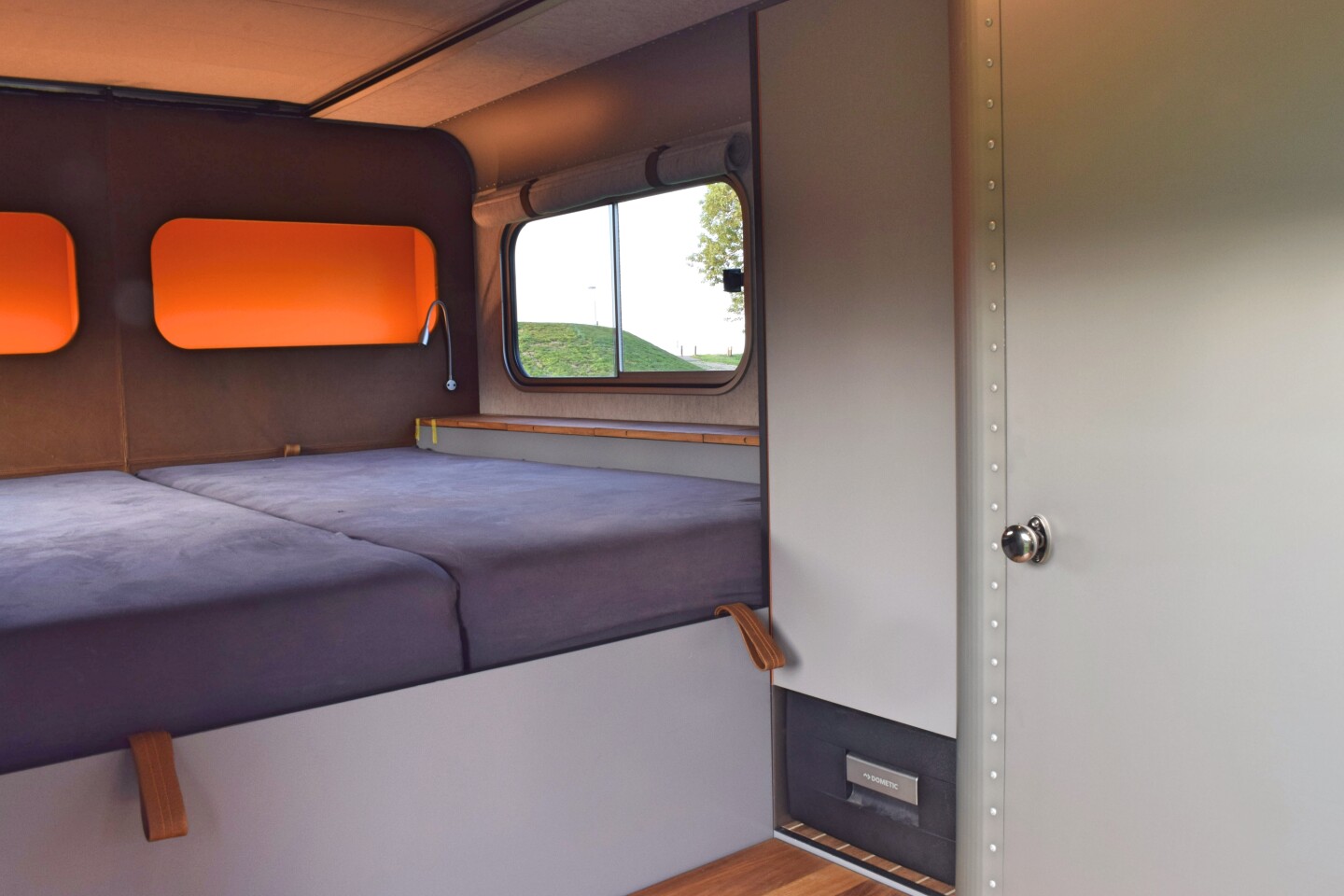 Inside, the LT540 packs an oversized queen bed, toilet room, and front sofa or kitchen