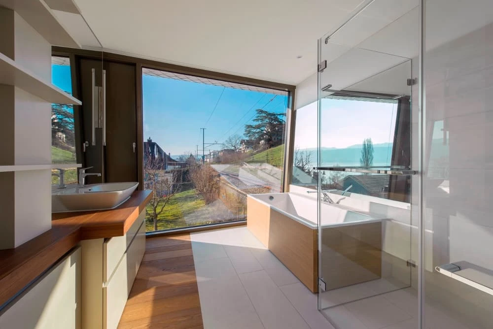 Thermally-activated concrete floors are paired to a geothermal heat pump for heating and cooling in Flexhouse