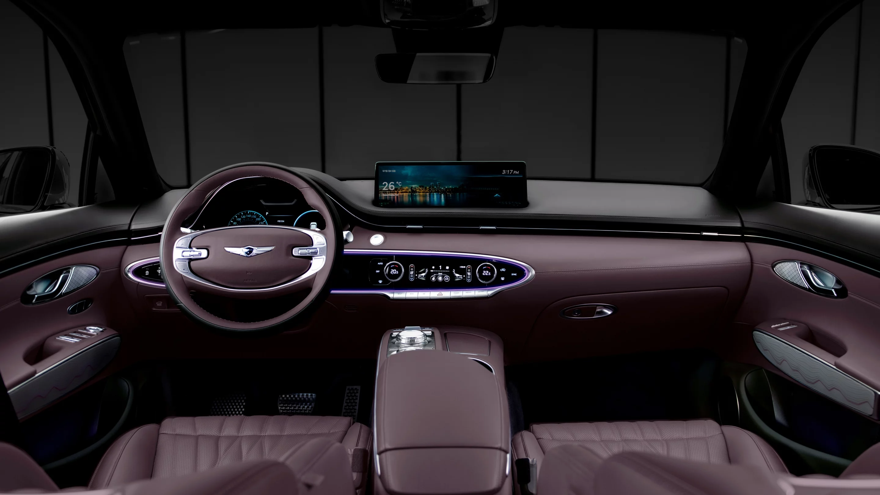 The interior of the 2022 Genesis GV70 features a large 14.3-inch in