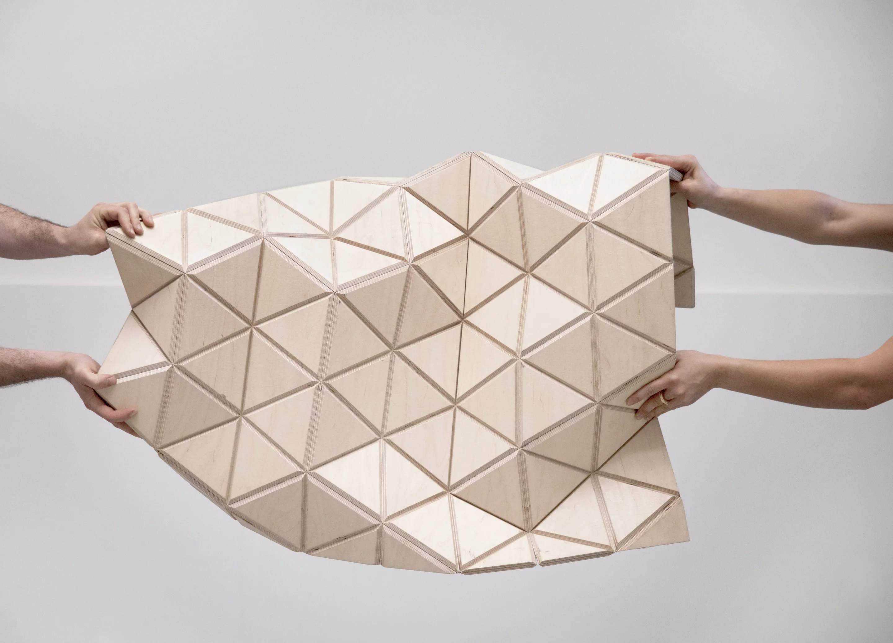 The current WoodSkin product is a sandwich of plywood triangular tiles with a textile mesh in-between (Image: MammaFotogramma)