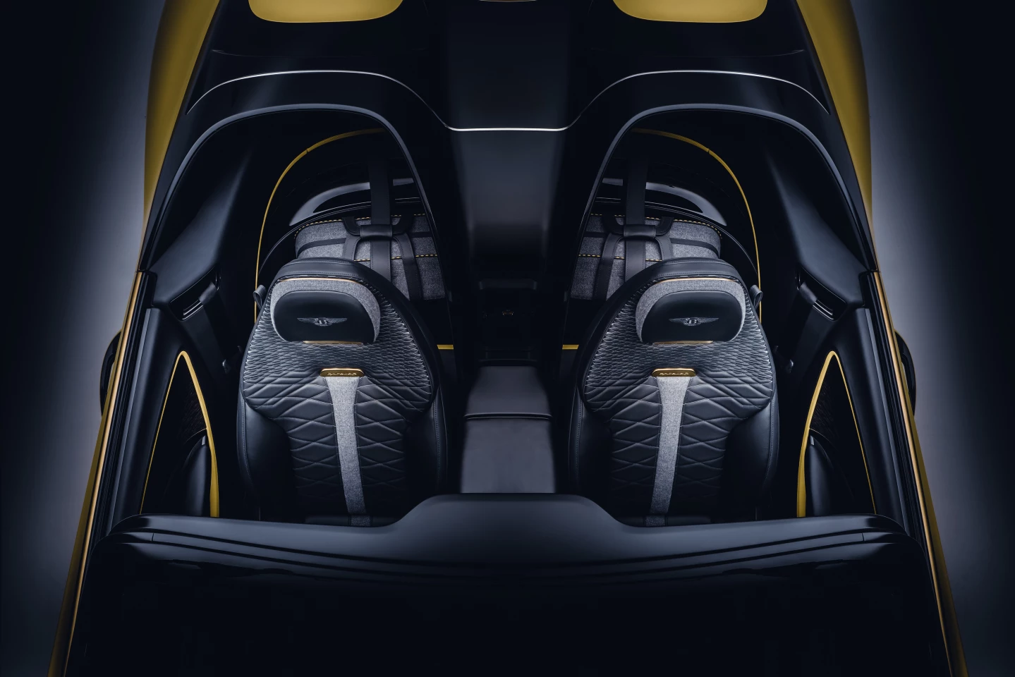 The rear seats of the Continental GT platform are replaced by compartments designed around bespoke Italian luggage