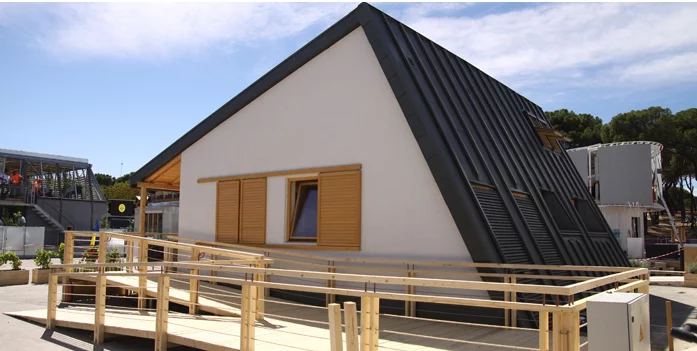 The structure’s asymmetrical lines provides for a north-facing facade that is slightly angled and thus protects the building from harsh Romanian winters