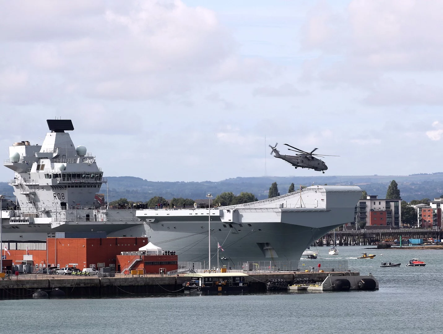 A helicopter leaving HMS Queen Elizabeth
