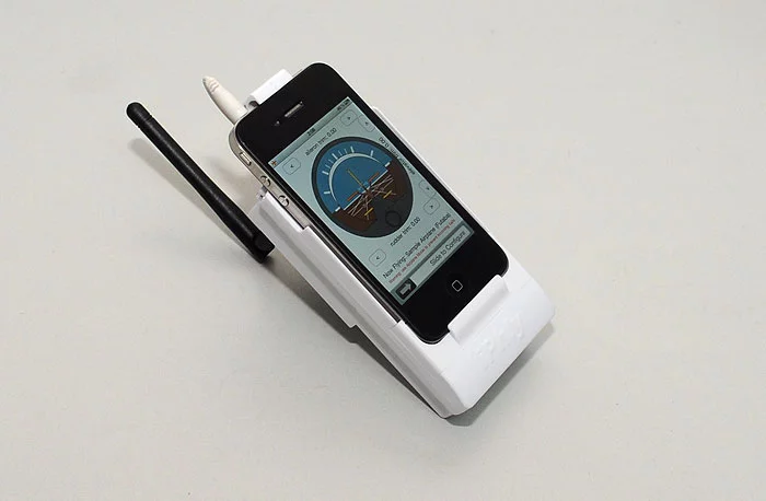 iPhly is an app and device for iPhone, that allows users to fly radio-controlled model airplanes via their phones (Photos: Ari Krupnik)