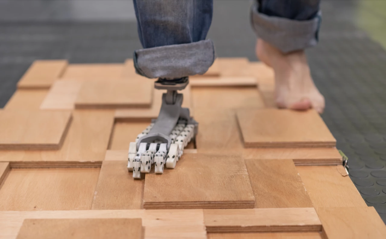 A volunteer puts the SoftFoot Pro to the test on an uneven walking surface