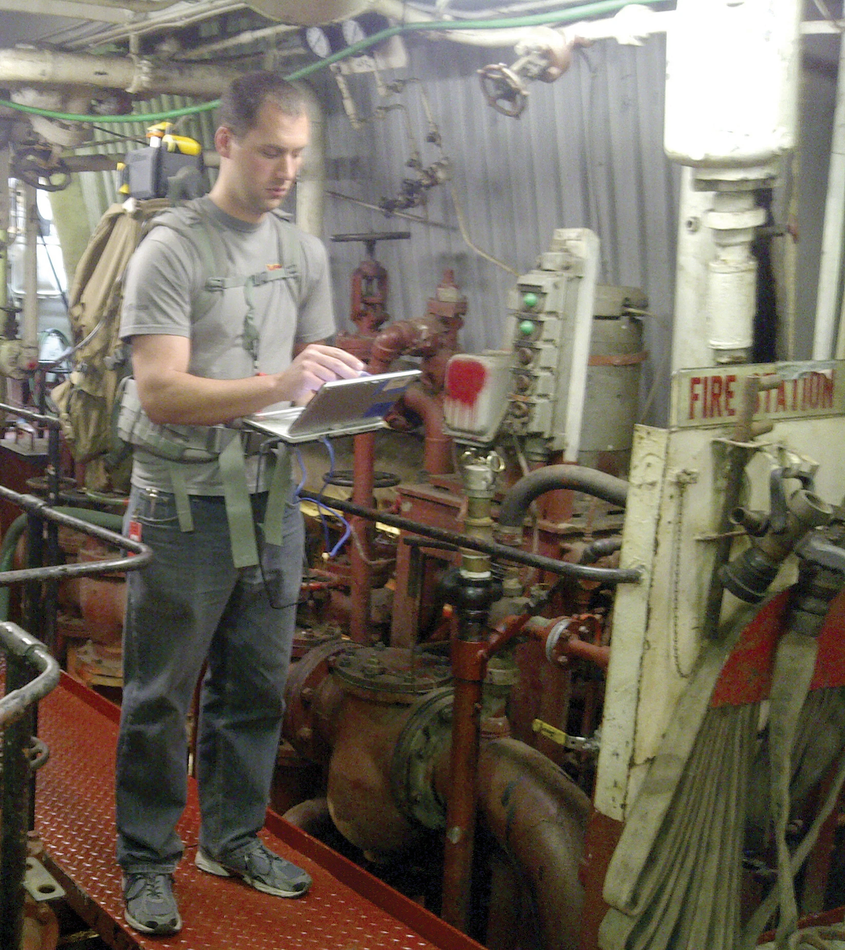 The backpack-mounted Enhanced Mapping and Positioning System (EMAPS), being tried out aboard a ship