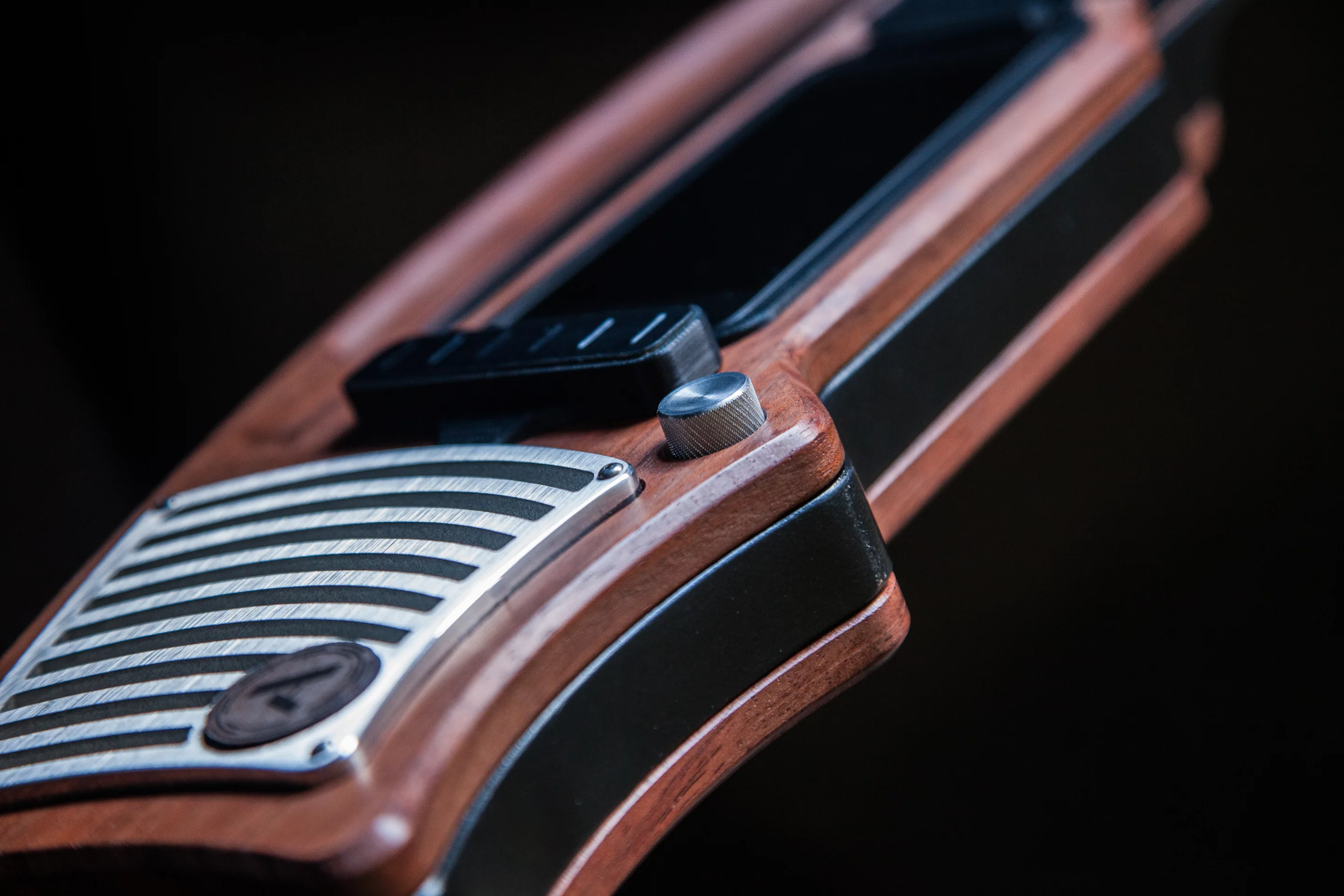 On one side of the central dock is a velocity-sensitive strum section that has the look of a covered guitar pickup