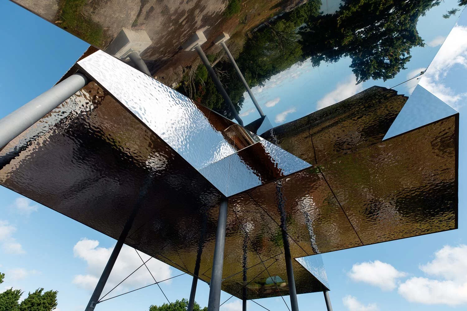 The SynVillan's mirrored facade is made from stainless steel