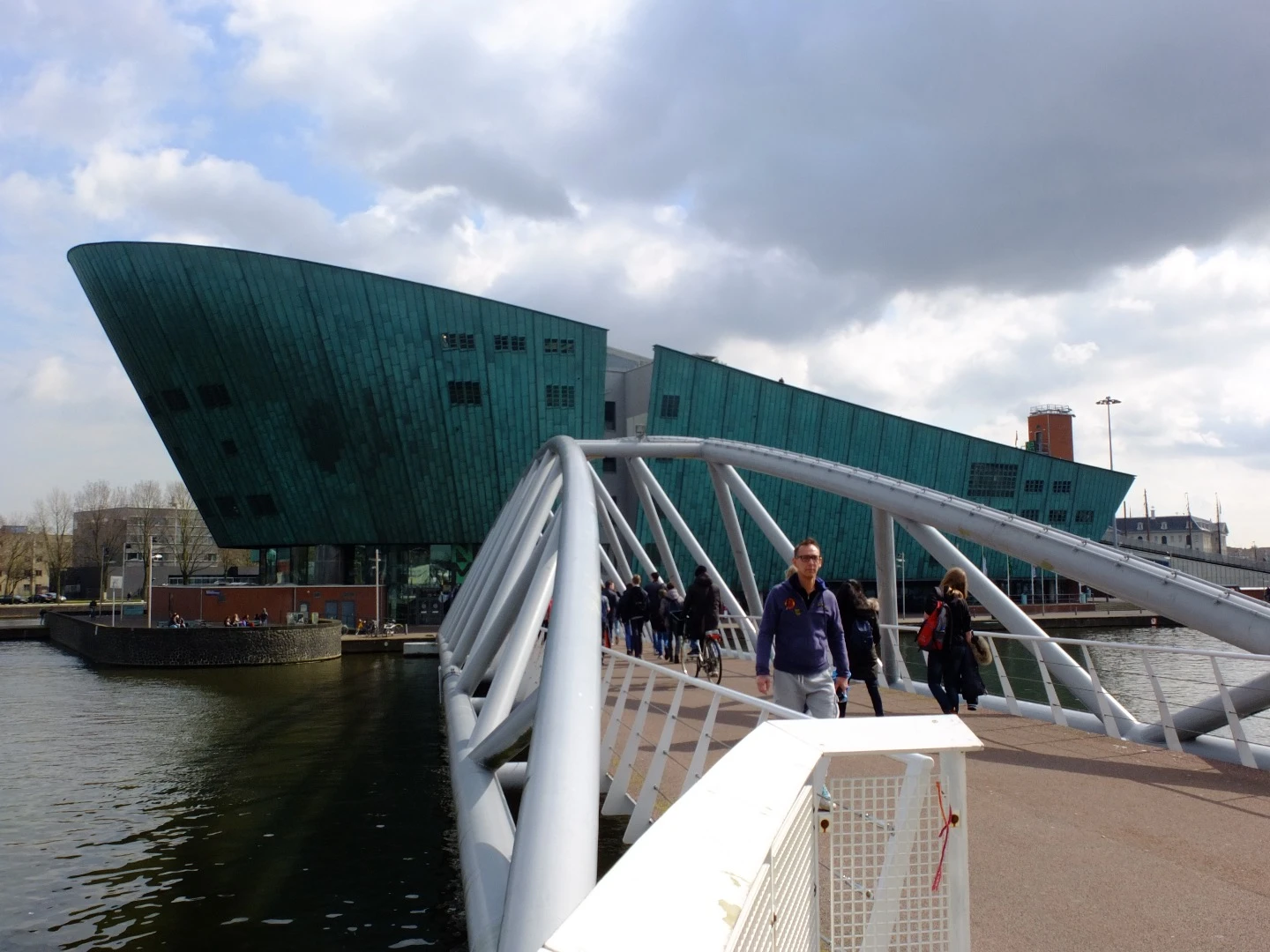 NEMO Science Museum designed by Renzo Piano is designed to appear as if its rising out of the water