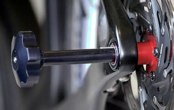 The Fasten system's thru-axle doesn't have to be completely removed, plus it incorporates a locking mechanism