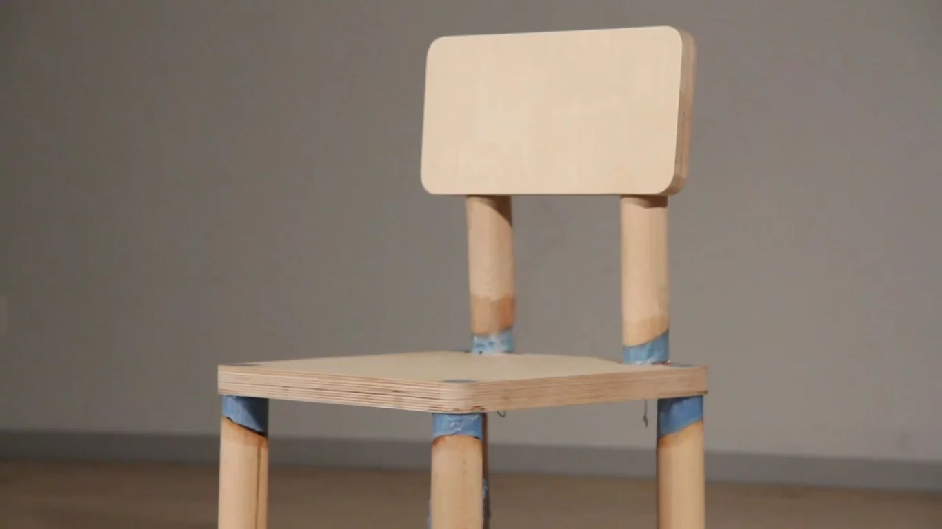 The "DRM Chair" is rigged with a counter that triggers it to fall to pieces after being sat on eight times