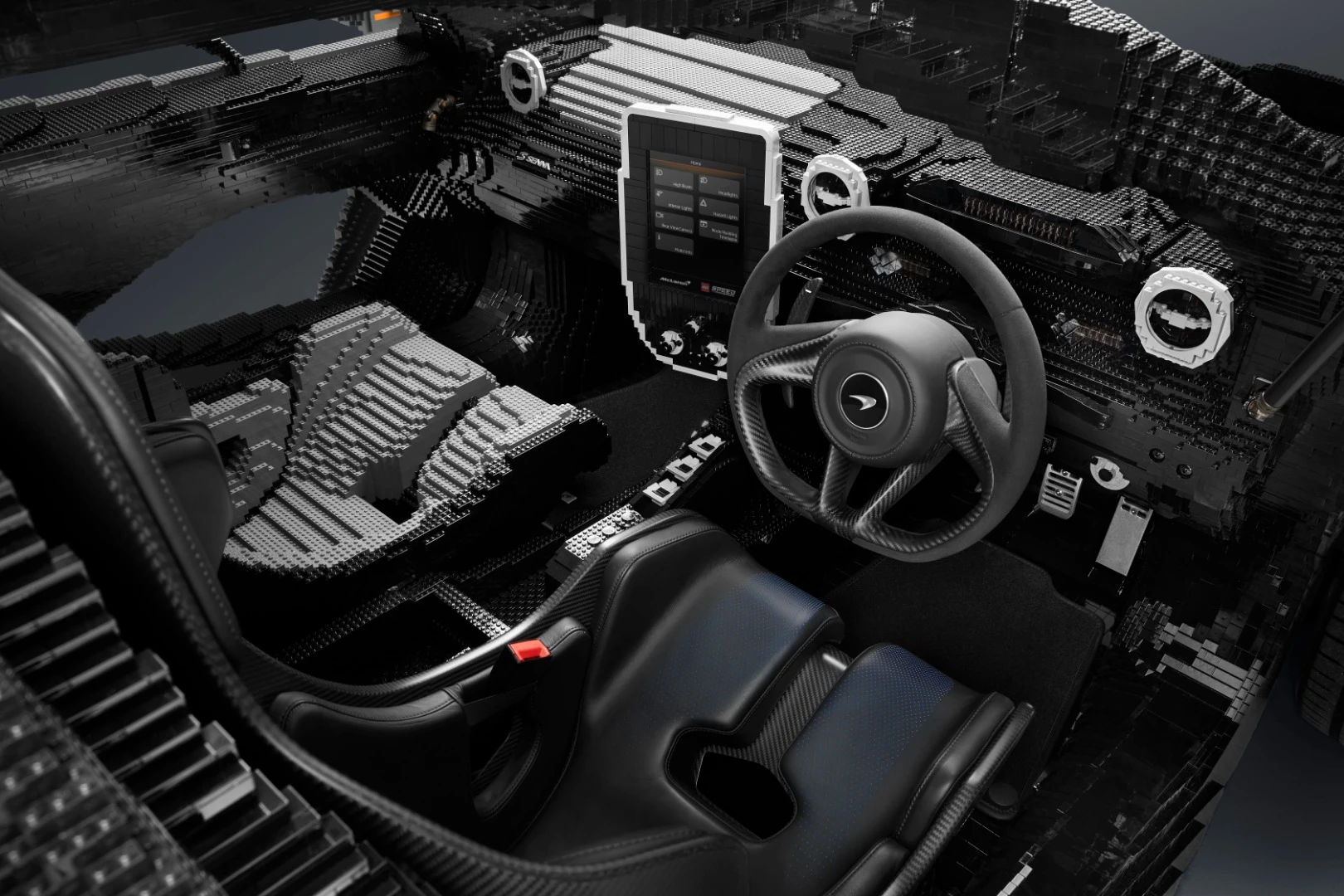 Interior features genuine McLaren carbon seat, steering wheel and pedals