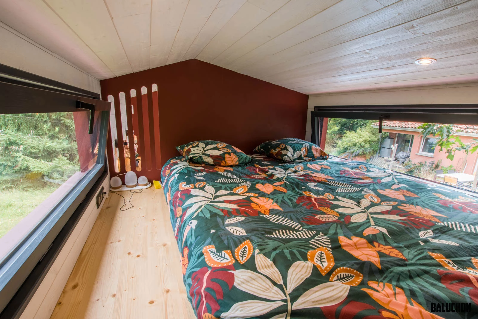The Browny's bedroom is a typical tiny house-style space with a low ceiling