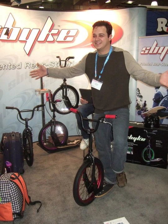 Bart Wilson shows off the sbyke at a recent trade show
