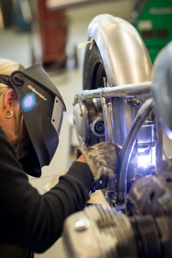 Ronna Noren while finalizing the supports for the Ohlins rear shock absorber