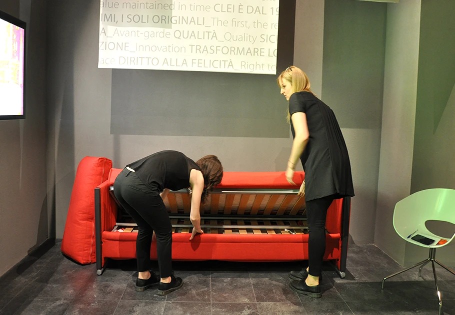 The sofa cushion raises up to reveal a single bed base