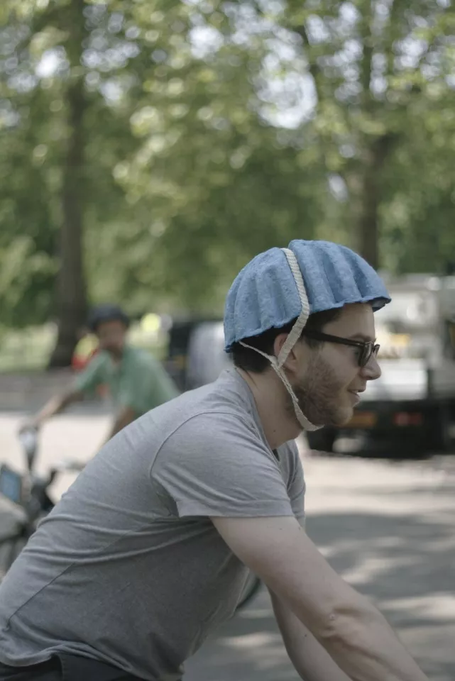 The Paper Pulp Helmet includes large grooves which accommodate the straps and allow the wearer to stay cool