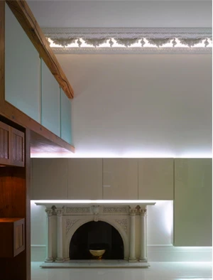 Utilizing the generous high ceilings, the central structure provides a second story