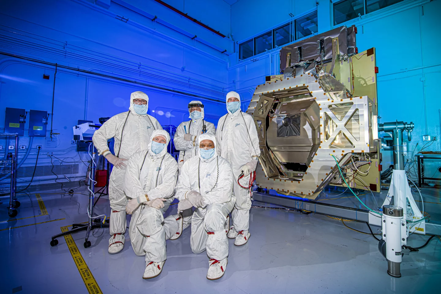 NASA’s Goddard team members along with the Ball Aerospace integration and test team pose after the sRCS is integrated into Roman's WFI