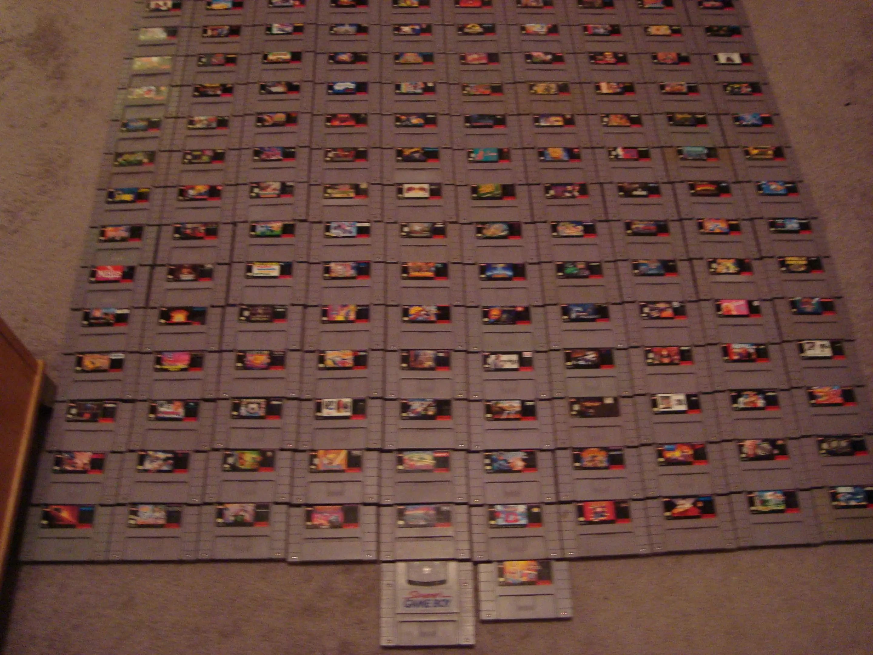 A ton of cartridges on display from this complete, $25,000 SNES collection