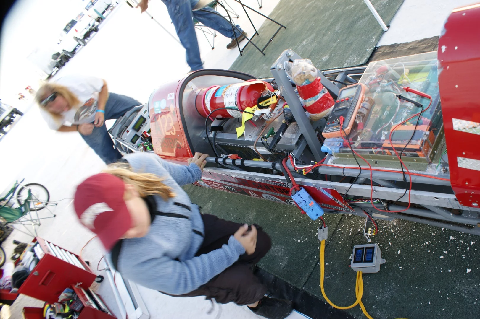 At work on the Killajoule land speed bike before a top speed run at Bonneville