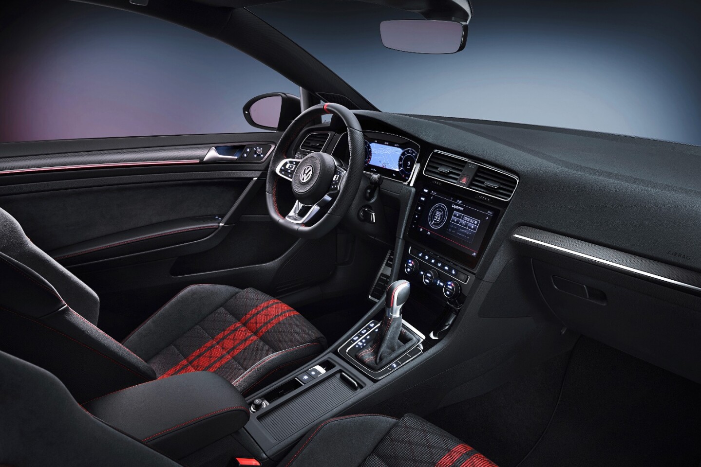 Found inside the Golf GTI TCR are sports seats dressed in microfiber covers with red motifs and stitching spread across the seats and shifter