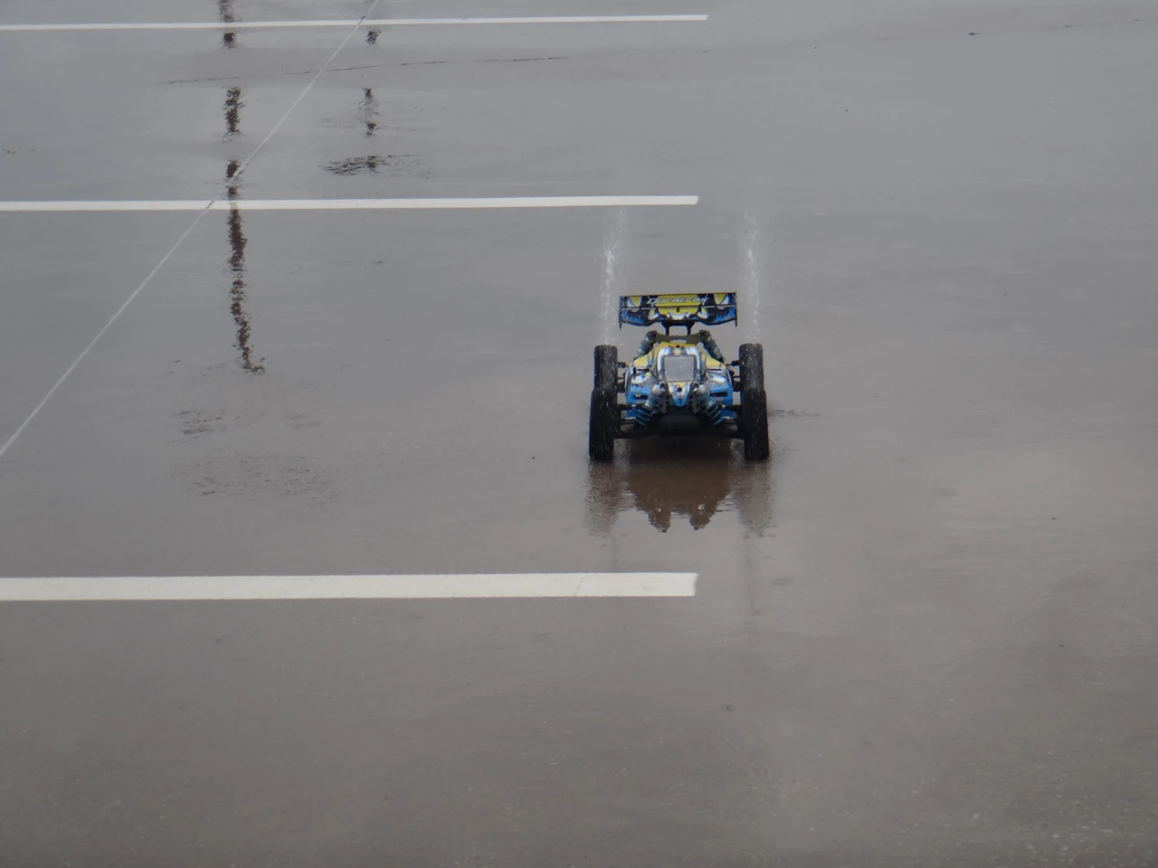 At full speed, the front tires will visibly lift off the ground a tad with each little bump in the road