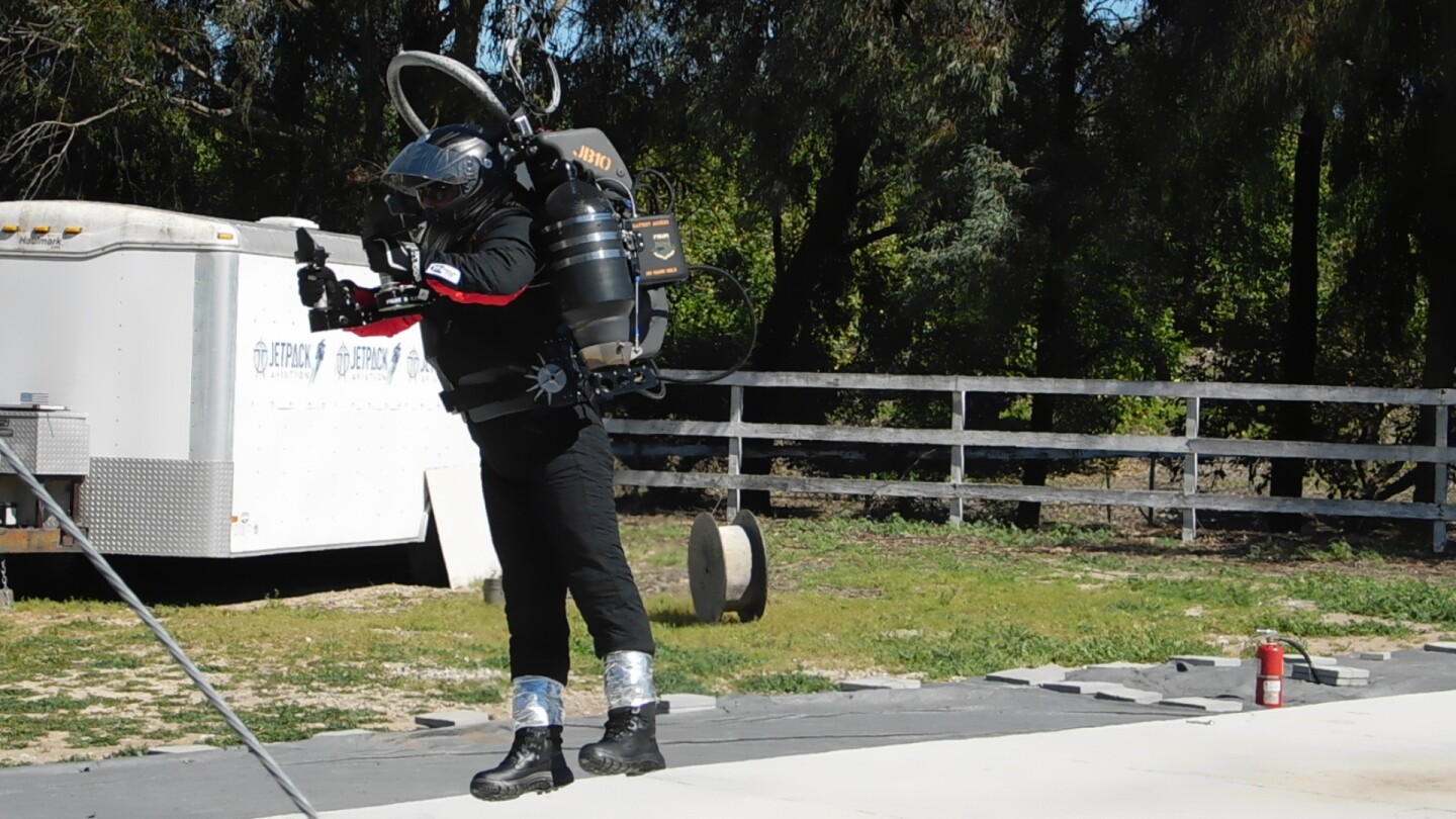 YouTube host Mischa Pollack successfully completes the first "civilian" jetpack flight with no formal training