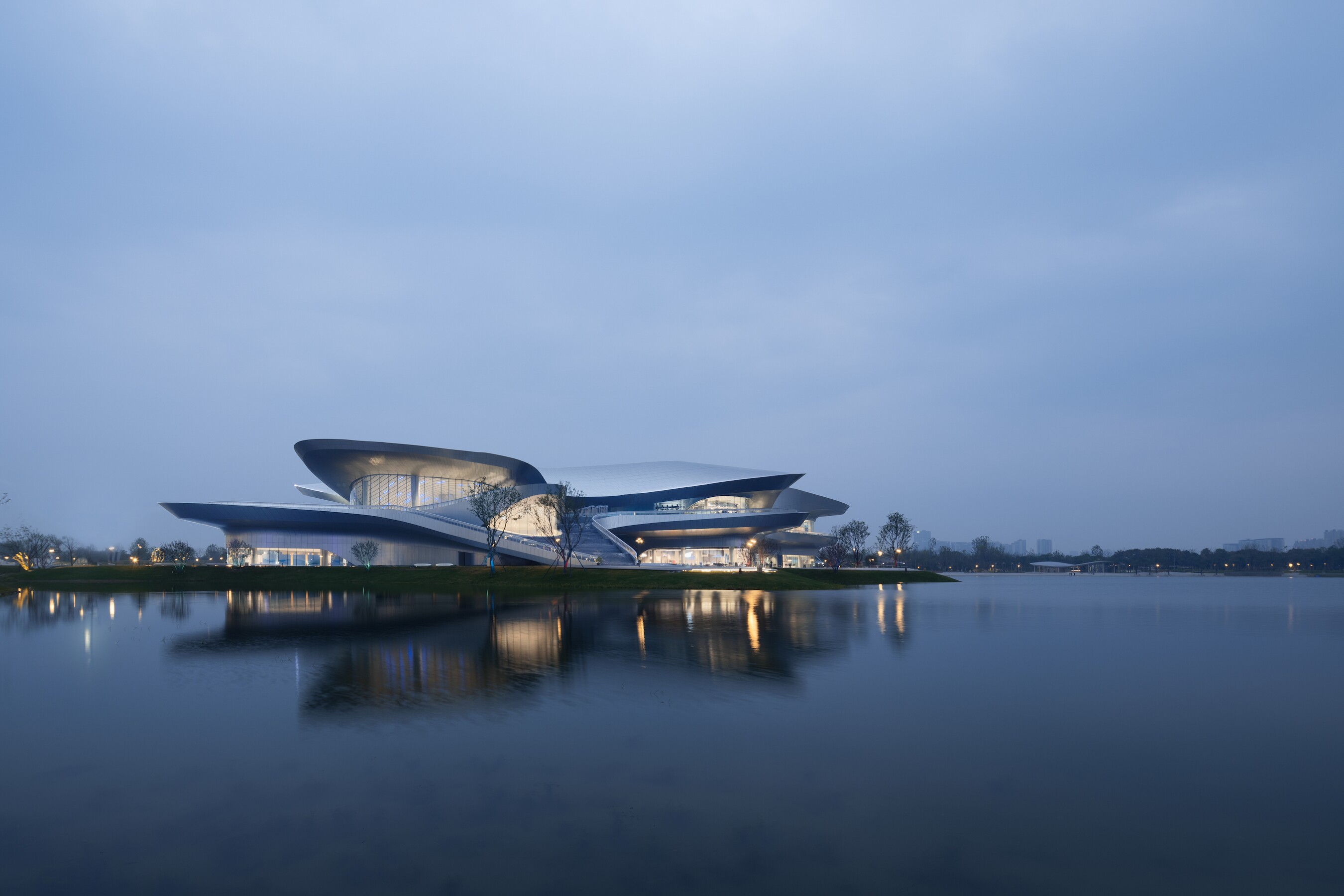 The Chengdu Science Fiction Museum's adjacent lake is used to collect and store rainwater, which is then filtered for use in the building