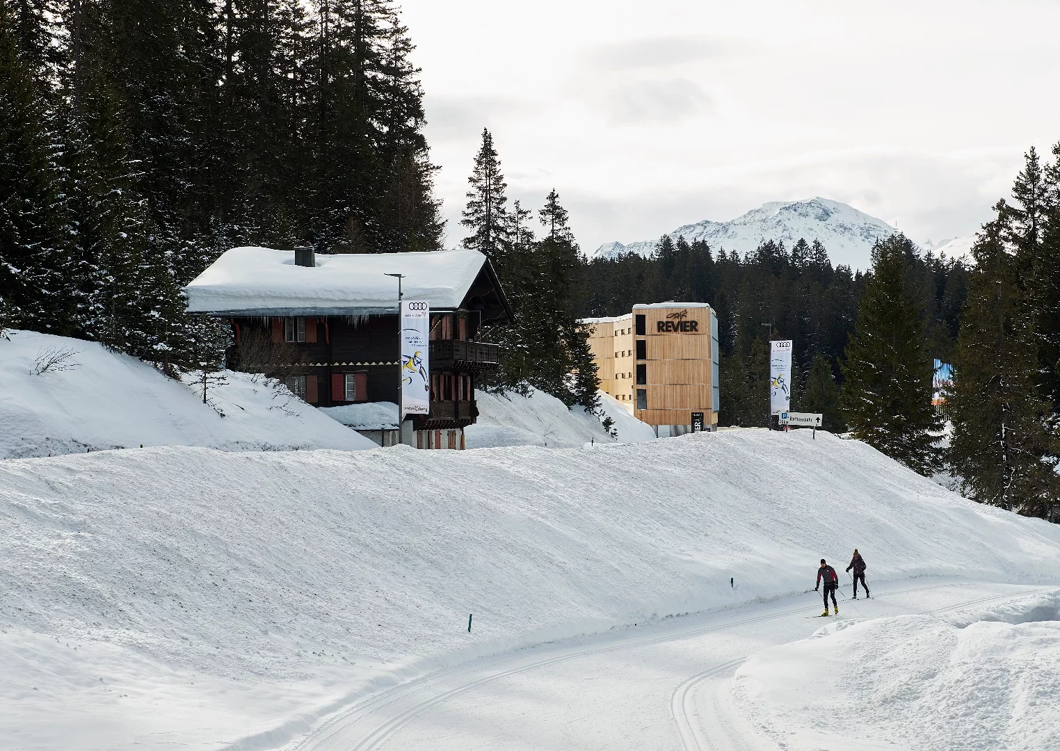 With a bed running from wall-to-wall and an end facing the lake through a floor to ceiling window, the modular rooms making up Switzerland's Revier Mountain Lodge are designed to mimic the camper van experience