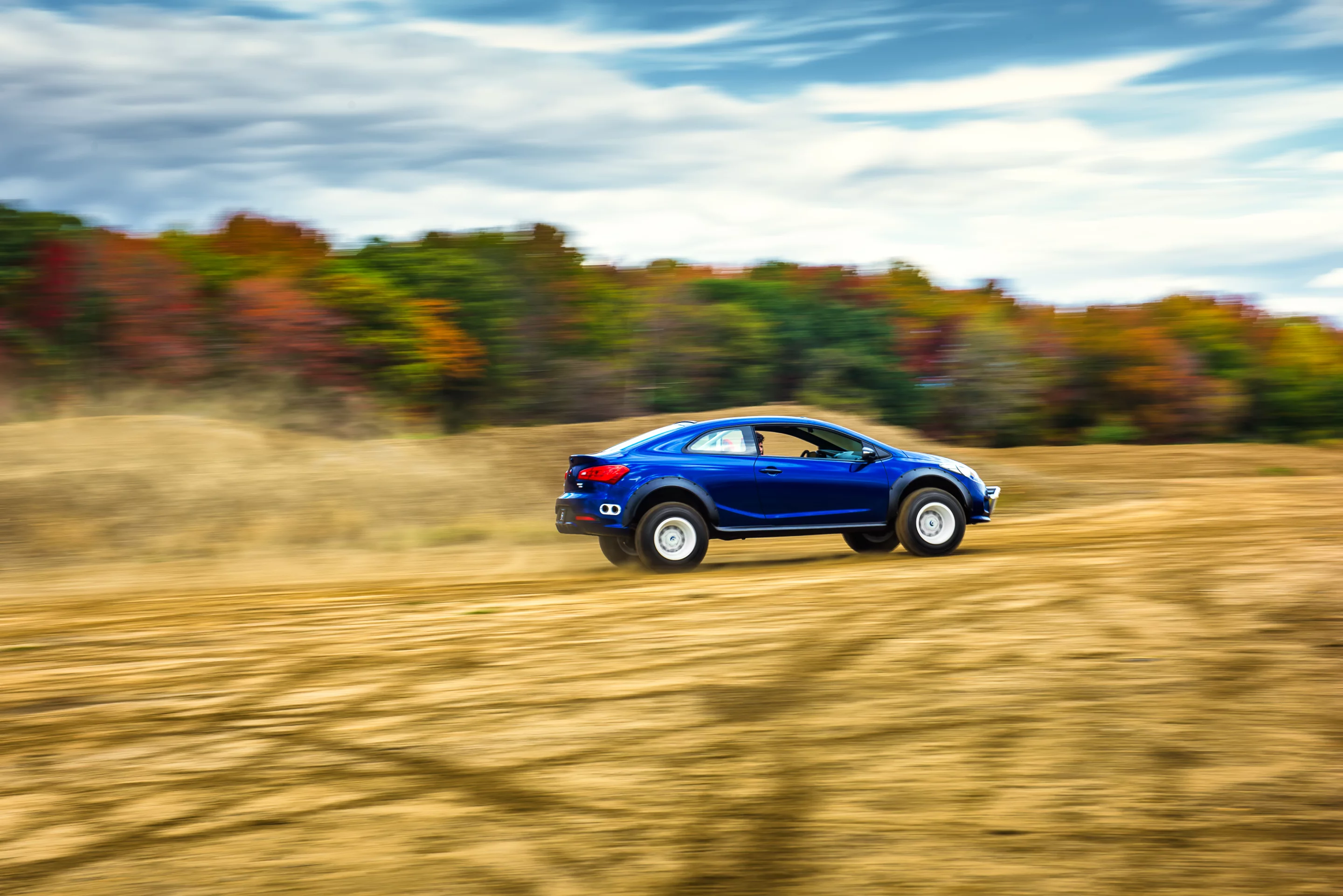 The Forte Koup Mud Bogger sits four inches higher than the stock car