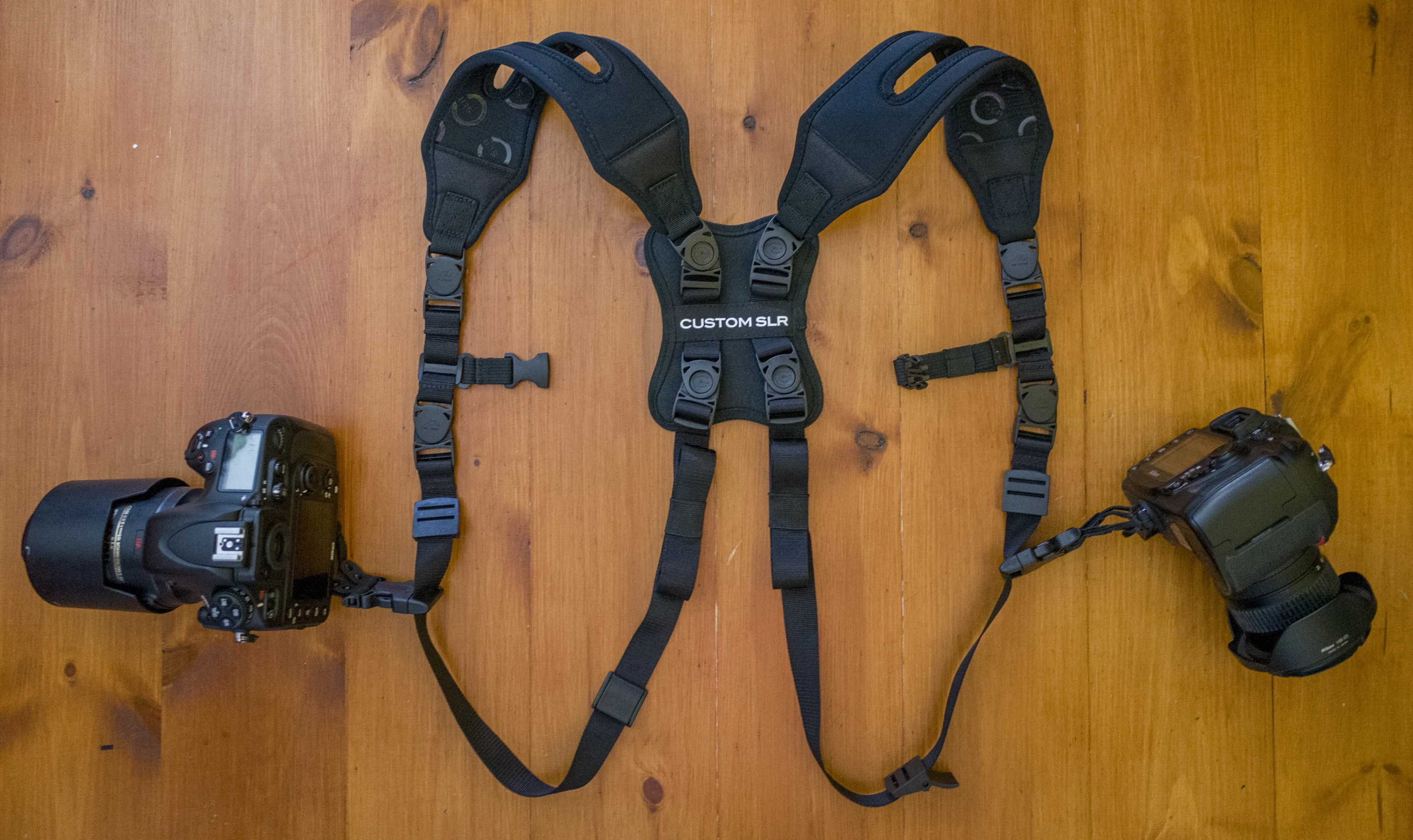 The Custom SLR Dual Camera Strap consists of two of the firm's Glide One Straps which are joined together with a sternum strap and back-pad