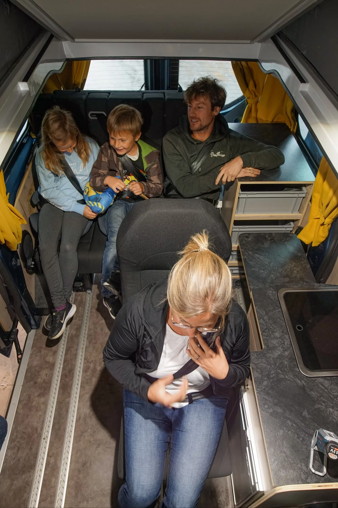 In this example, positioning the single seat in front of the Southvan Allrounder bench makes room for the available storage shelf