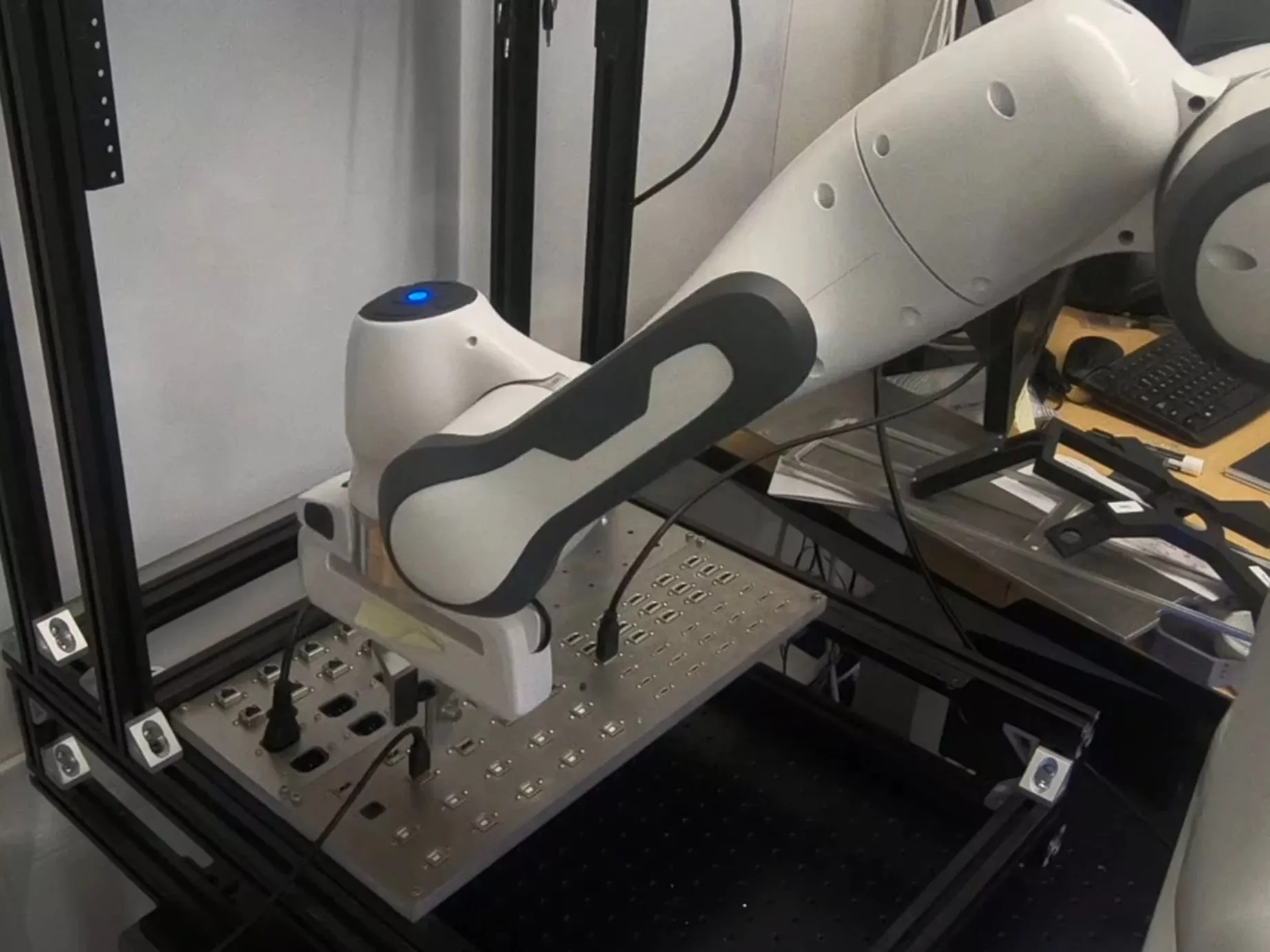 Machine learning and force control are employed to teach this robot how to insert three different power connectors into the appropriate ports