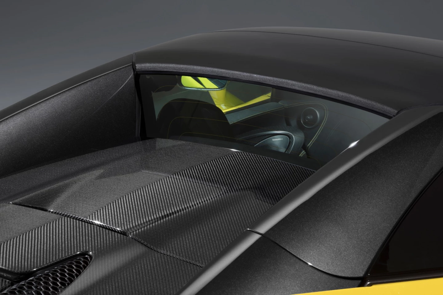 A glazed wind deflector helps cut buffeting in the 570S Spider cabin