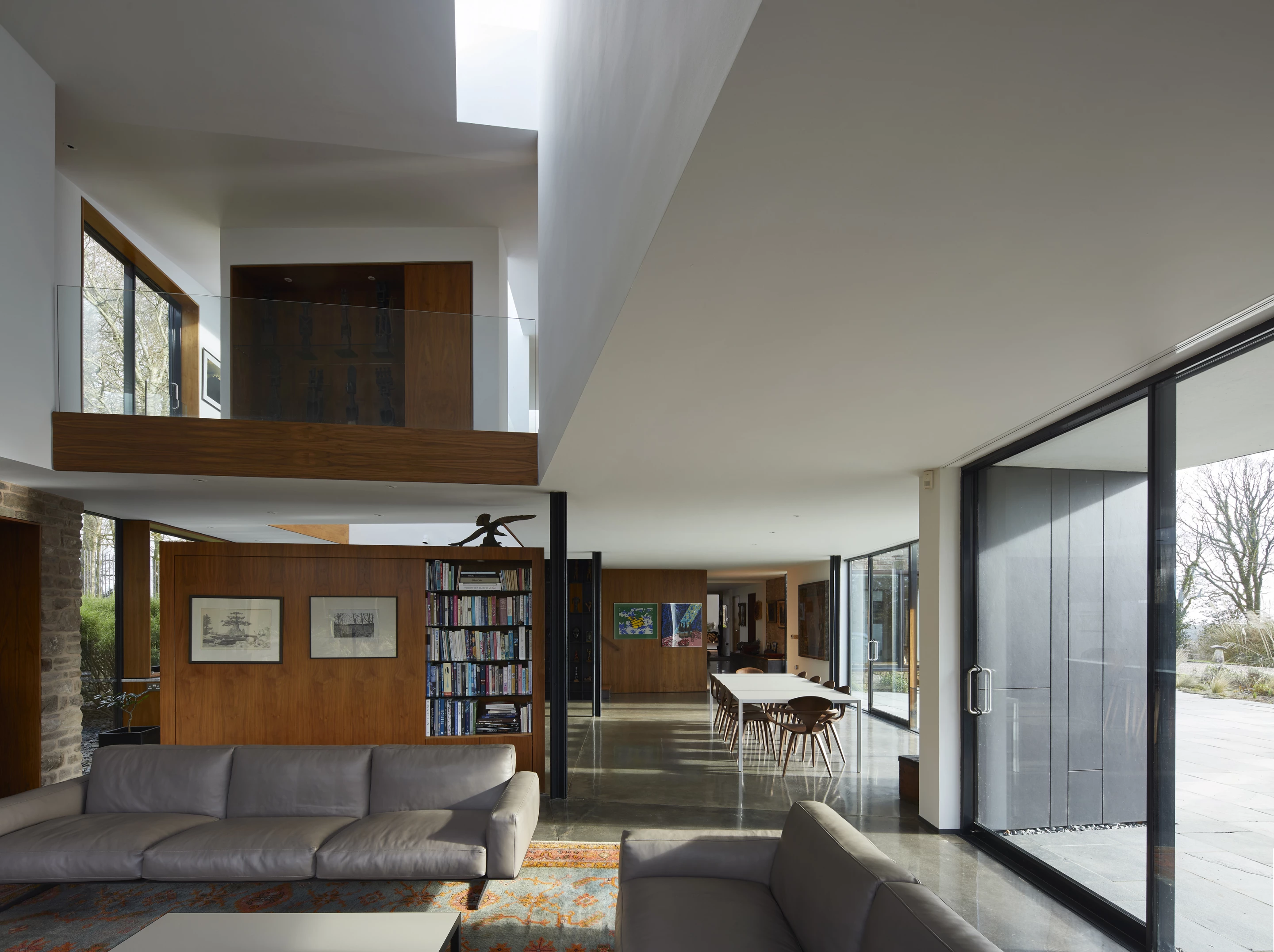 The House on the Hill's ground floor features an open layout that's centered around a kitchen and maximizes light inside with generous glazing