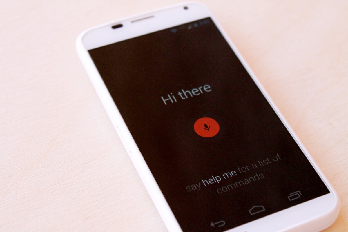 After "training" your Moto X, say the phrase "OK, Google Now" to activate Touchless Control